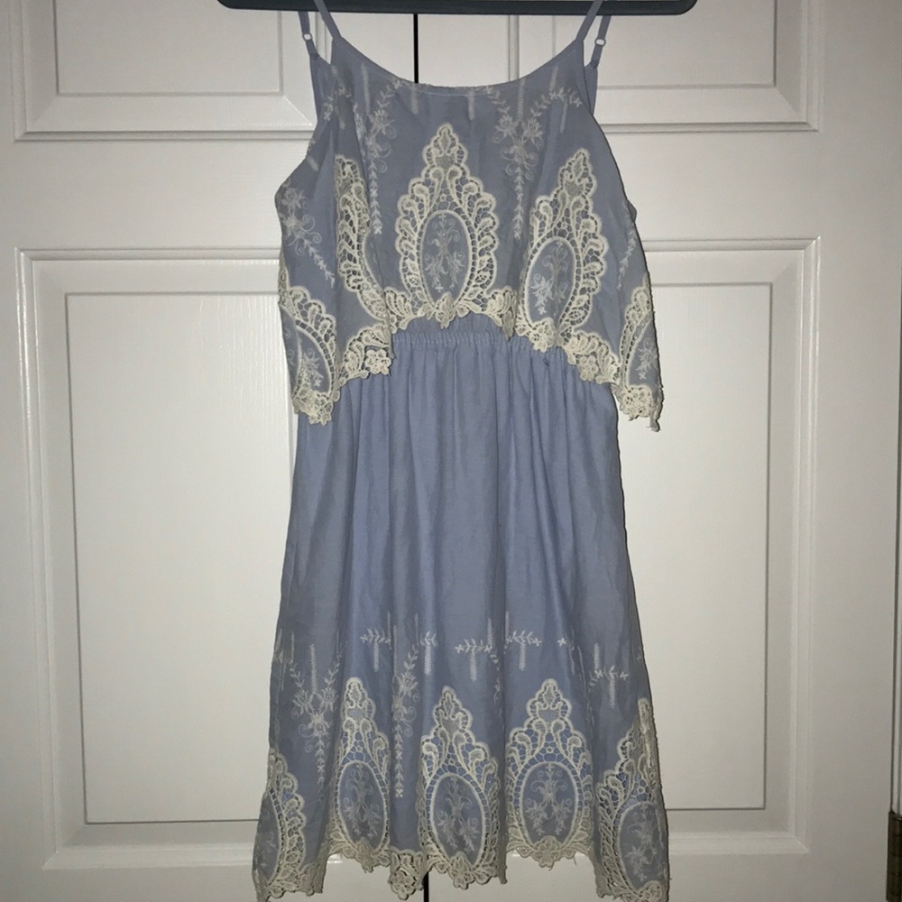 Carolina blue with white lace dress.